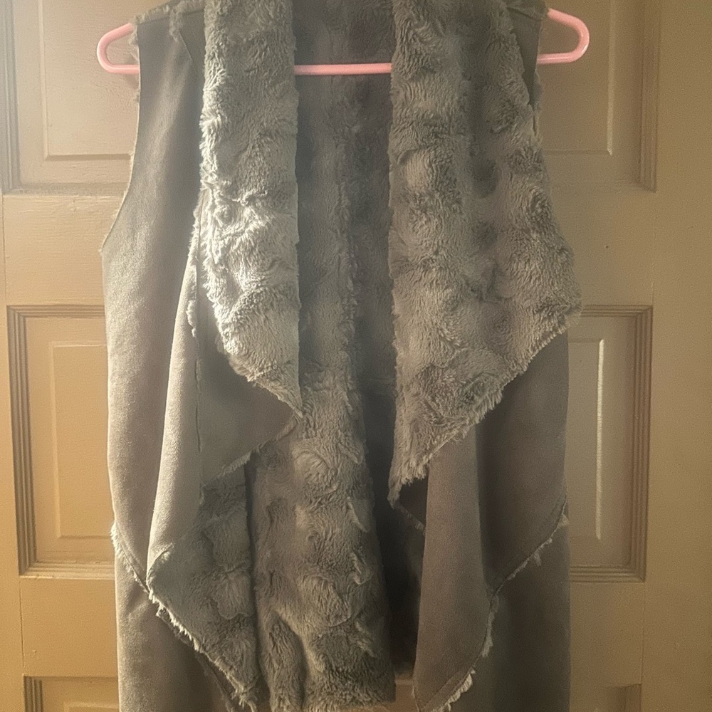Altered state sleeveless coat